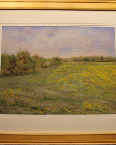 Chalk pastel landscape painting 'Yellow Fields in Grayville Illinois' by R.L. Lathrop showing a yellow flower field beneath pink-tinted skies, featured at Hedgewood Galleries in Connersville, Indiana